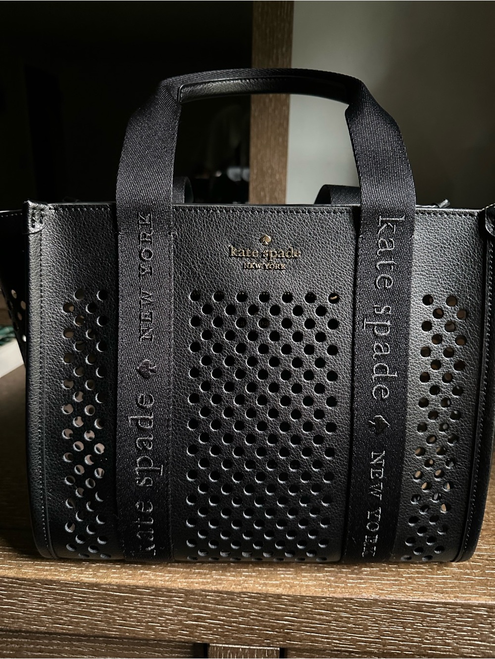 Kate Spade Black Perforated Leather Tote with Logo Webbing Straps
Used once !